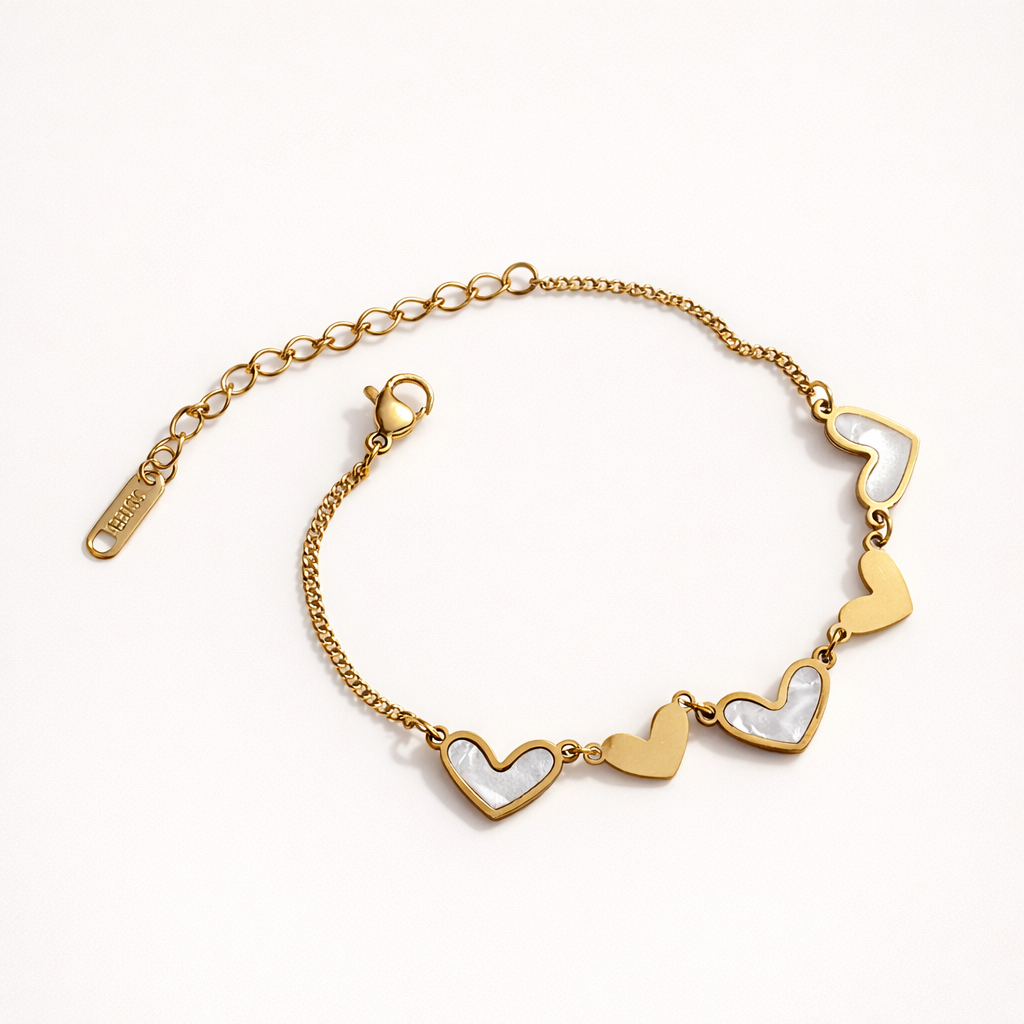 Gold bracelet with heart-shaped links on a marble surface Saar Beauty heart charm gold bracelet for women waterproof jewellery
Anti tarnish heart charm bracelet daily wear fashion jewellery