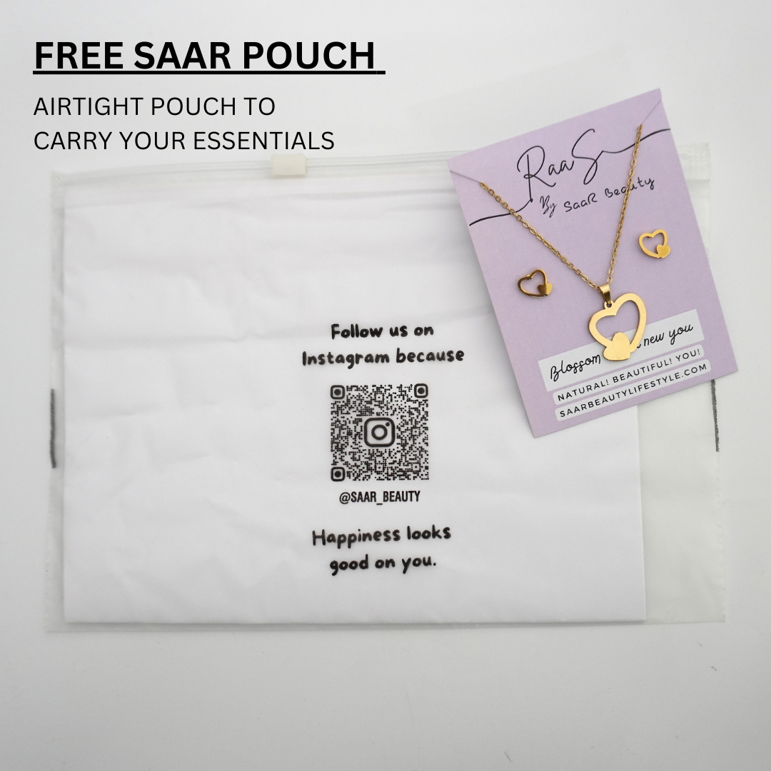Stylish heart-shaped gold necklace and earrings displayed with SaaR airtight pouch for secure storage.