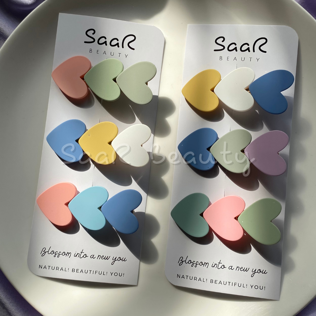 Discover SaaR Beauty’s Premium Heart Hair Clips. A set of 3 matte pastel clips, offering elegance, durability, and secure grip for all hair types. Perfect for any occasion!