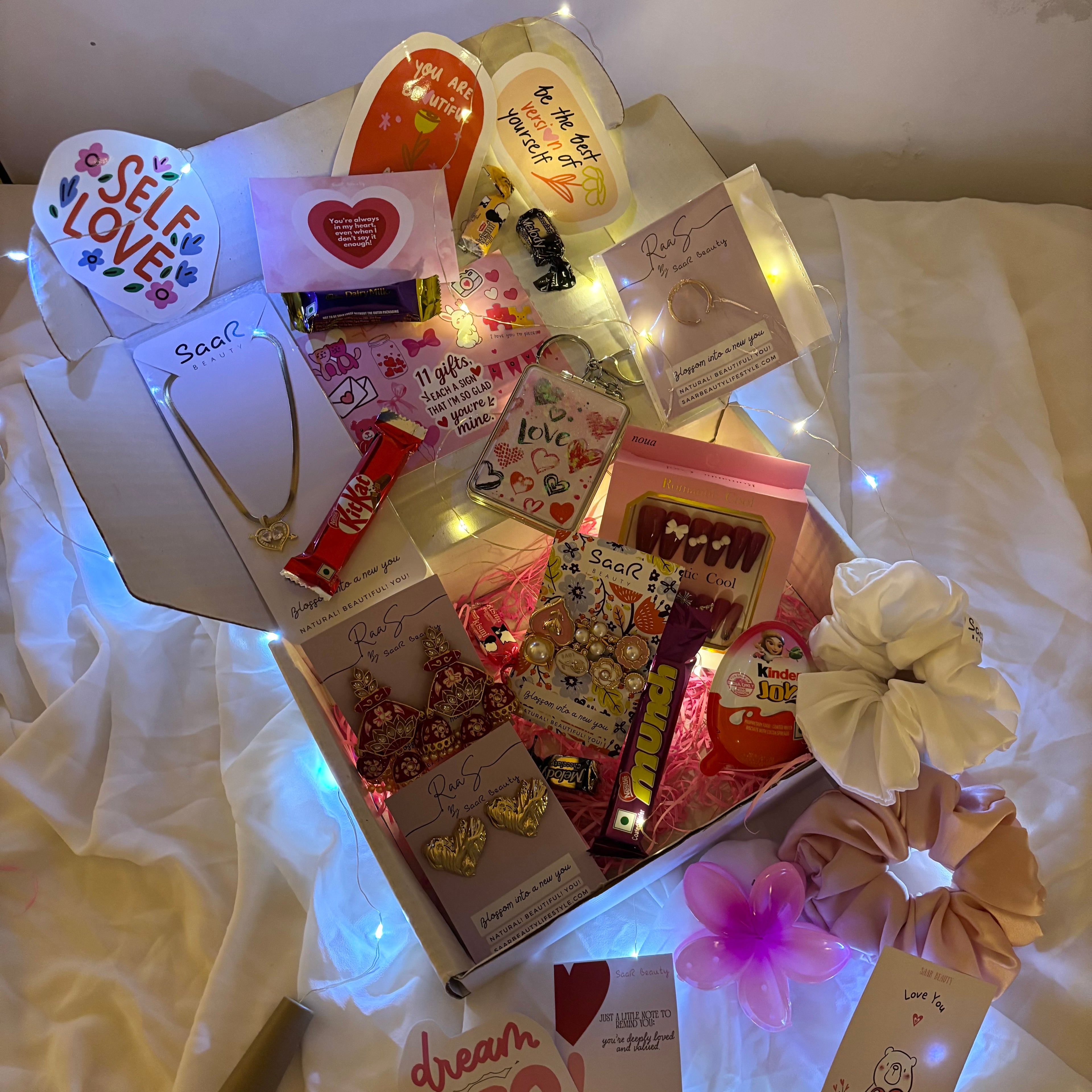 Luxury Pinterest-style self love hamper with fairy lights, chocolates, scrunchies, jewelry, and surprise gifts for girls & women – SaaR Beauty
