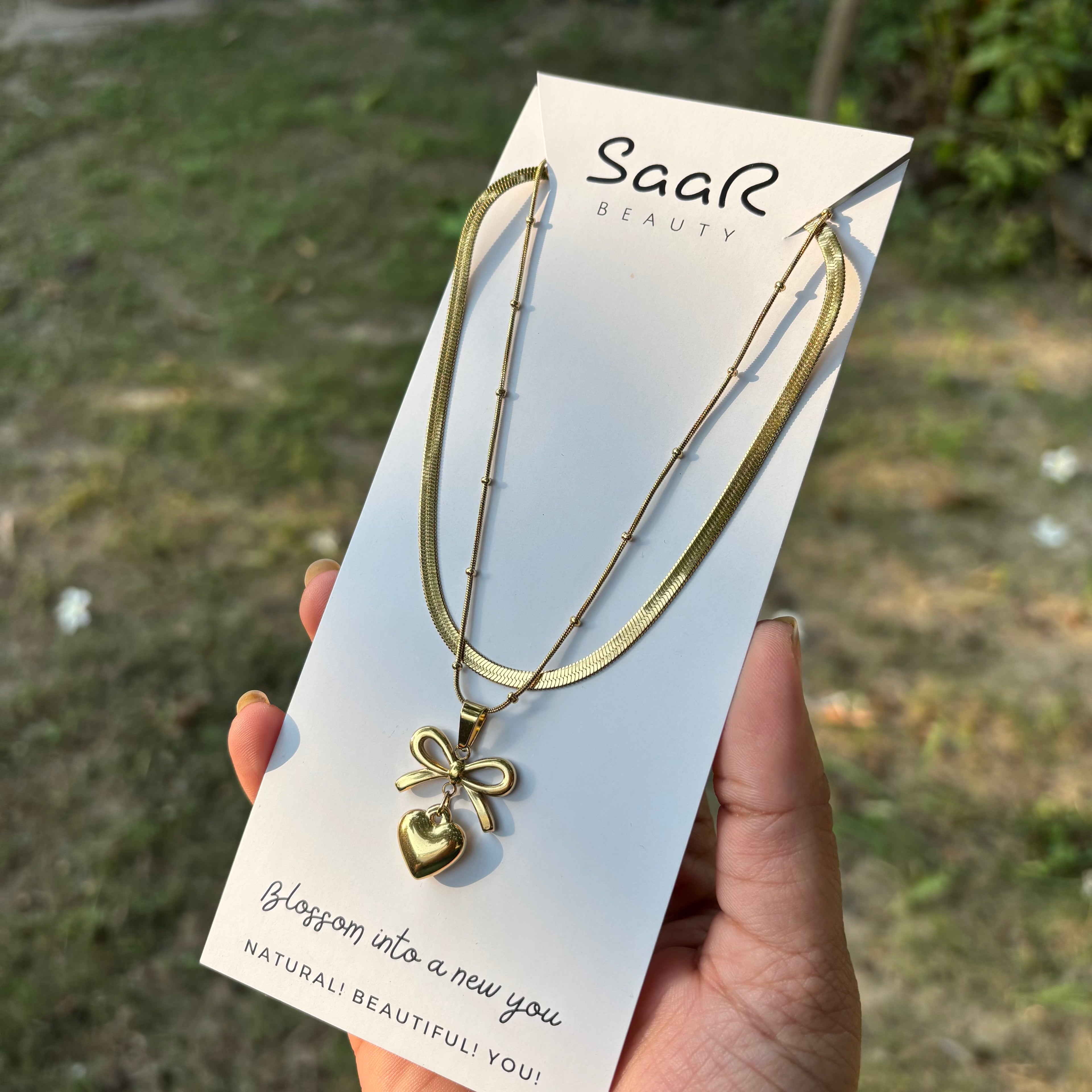 Pure Romance BowHeart Gold Necklace