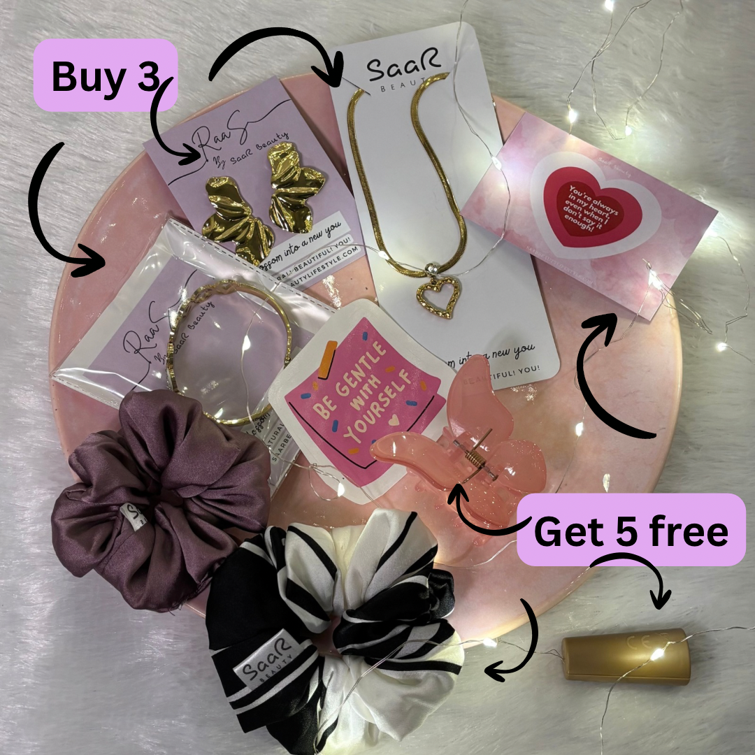 Collection of hair accessories and jewelry on a pink plate with promotional text.