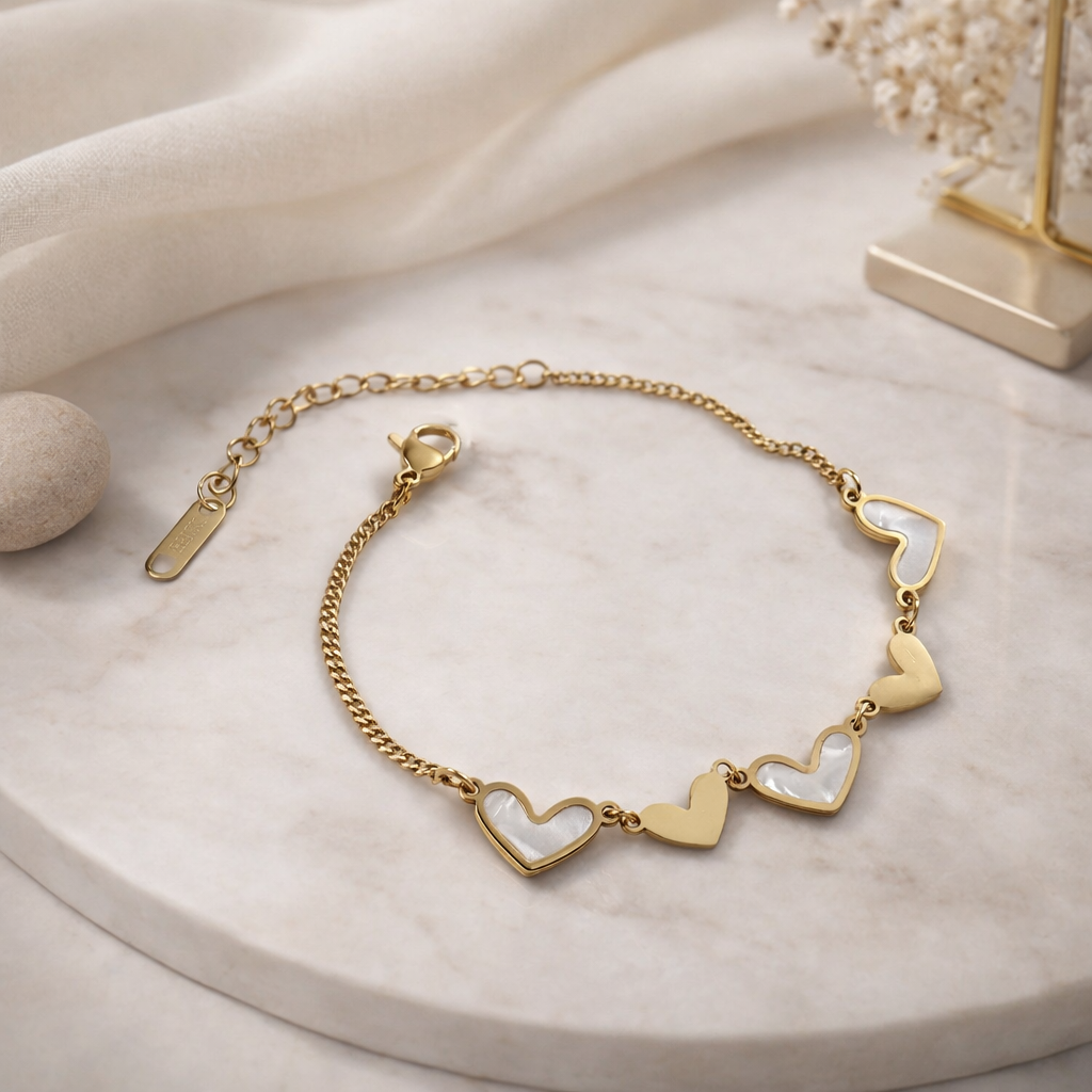 Gold bracelet with heart-shaped links on a marble surface Saar Beauty heart charm gold bracelet for women waterproof jewellery
Anti tarnish heart charm bracelet daily wear fashion jewellery