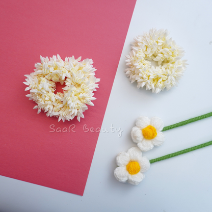 Shop the Traditional Gajra Scrunchie for weddings and festive occasions. This artificial floral accessory offers a realistic jasmine look, perfect for bun hairstyles and bridal ceremonies.
