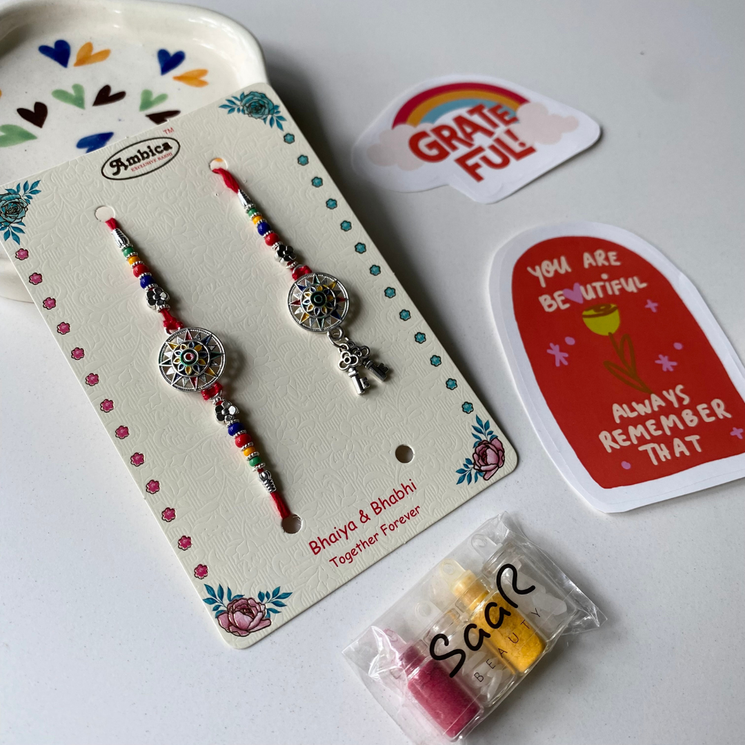 THE SURYA MANDALA KEY SNEH RAKHI FOR BHAIYA &amp; BHABHI (SET OF TWO)