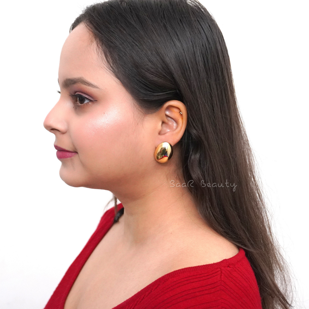 Elegant oval-shaped earrings by SaaR Beauty, featuring a sleek minimalist design. Anti-tarnish and waterproof, perfect for women and girls to complement casual and formal outfits. Lightweight, durable, and timeless jewelry accessory."