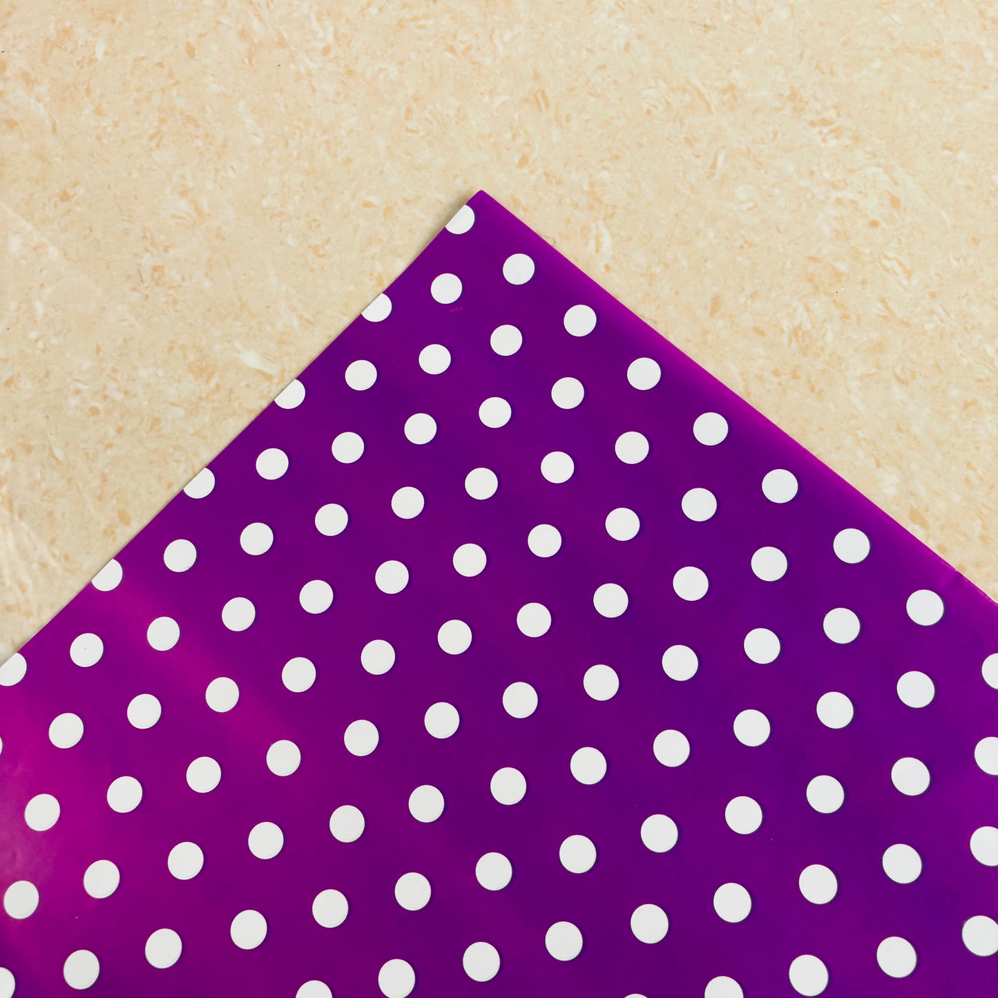 Purple polka dots gift wrap