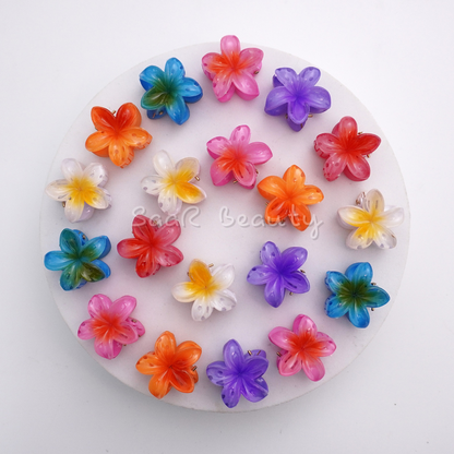 Mini flower claw clutcher set of 3 by SaaR Beauty. Vibrant combos: Blue/Red/Yellow or Purple/Pink/Orange. Secure grip, durable, and perfect for all hair types!