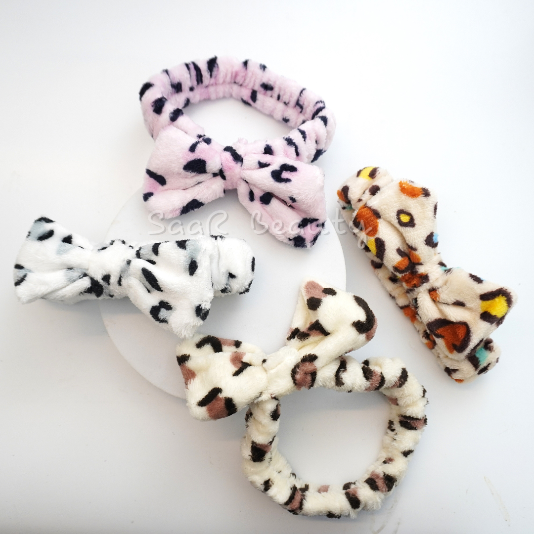 Stay stylish during your beauty routine with our Leopard Print Makeup Hair Band! Soft plush material, bow accent, and stretchable fit make it ideal for thick and thin hair. Perfect for makeup, skincare, or casual outings. Available in 6 chic shades