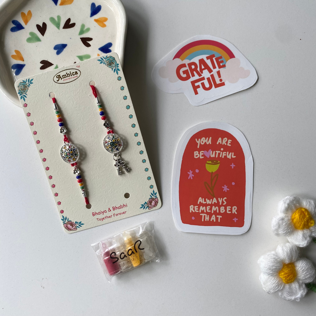 THE SURYA MANDALA KEY SNEH RAKHI FOR BHAIYA &amp; BHABHI (SET OF TWO)