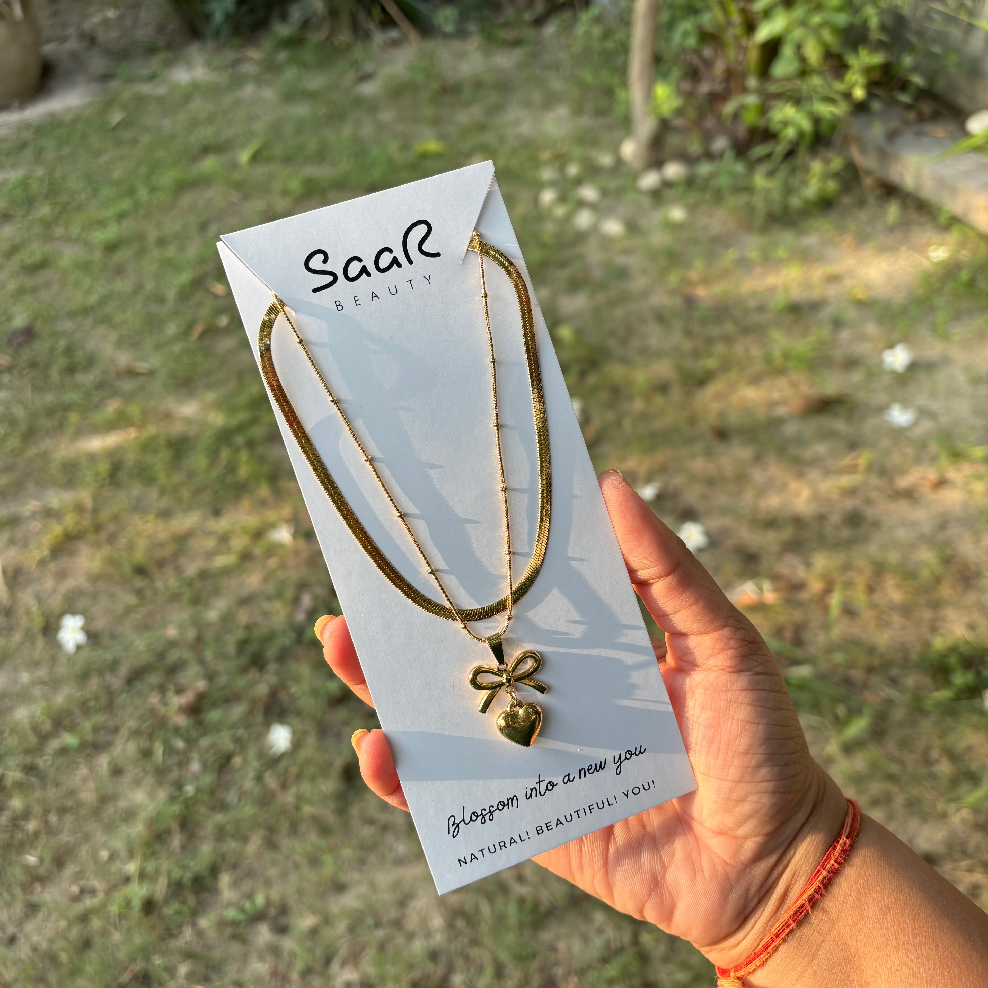 Pure Romance BowHeart Gold Necklace