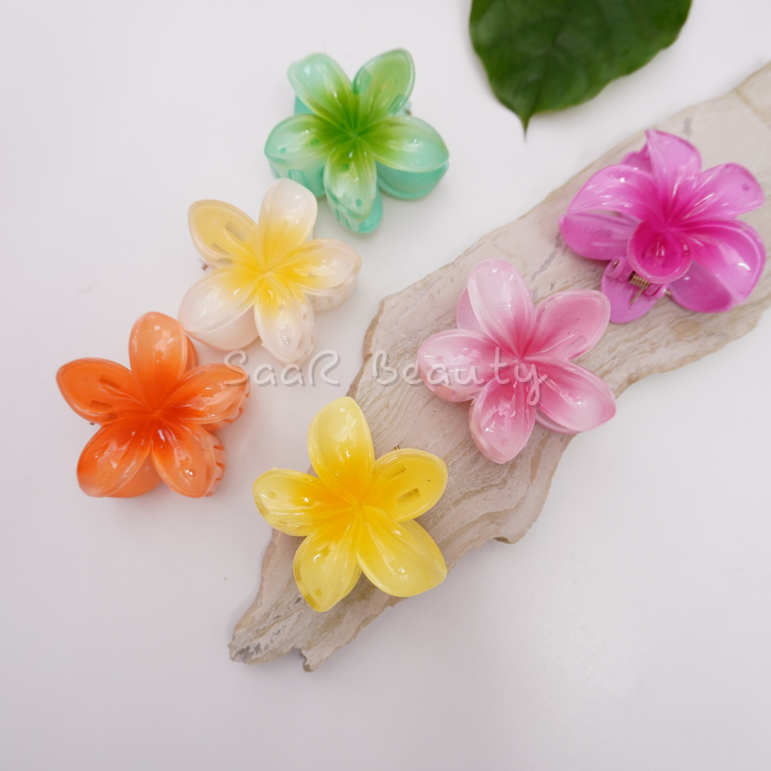 Stylish medium flower claw hair clip by SaaR Beauty. Vibrant printed colors, durable build, secure grip, and perfect for all hair types. Chic and versatile!