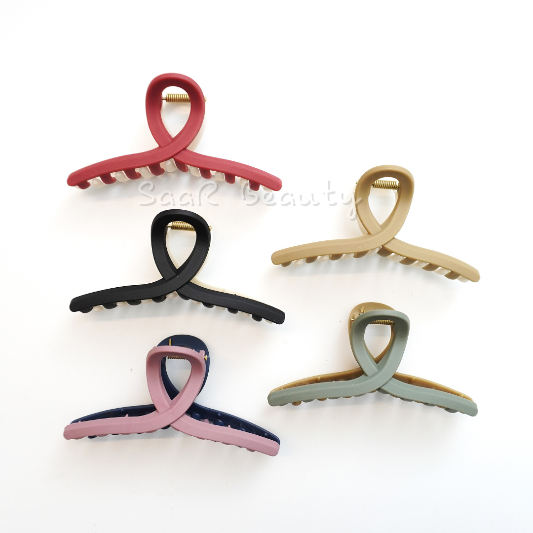 Elevate your style with our Dual-Shade Hair Claw Clip! Perfect for thick, thin, or long hair, this durable, matte-finish clutcher offers a secure grip and is available in six trendy shades. Ideal for everyday use!