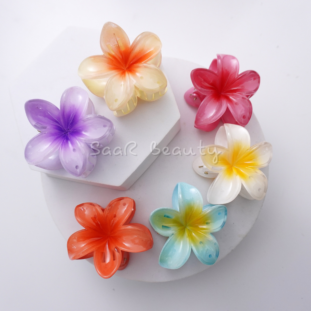 Stylish medium flower claw hair clip by SaaR Beauty. Vibrant printed colors, durable build, secure grip, and perfect for all hair types. Chic and versatile!