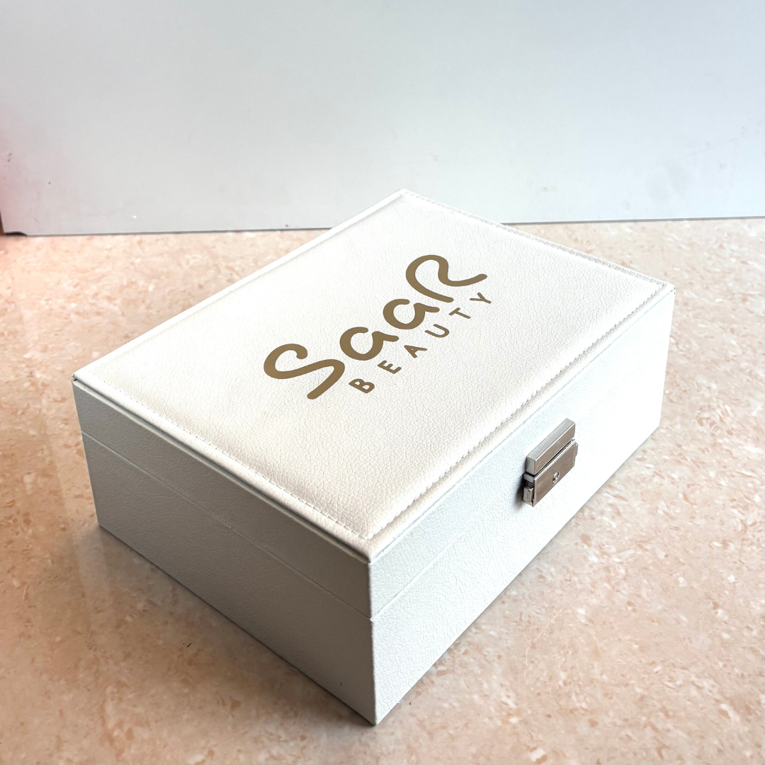 SaaR Beauty Leather Jewelry Organizer – Elegant, compact storage box with multiple compartments for rings, earrings, necklaces, and bracelets in white colors.