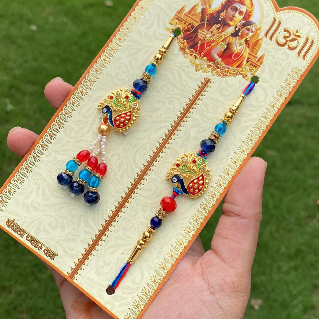 RAM DARWAR PEACOCK SNEH RAKHI FOR BHAIYA & BHABHI (SET OF TWO)