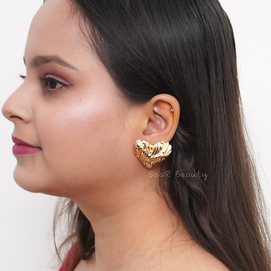 Shop SaaR Beauty Textured Heart Anti-Tarnish Earrings. Waterproof, lightweight, and stylish. Perfect heart-shaped earrings for women and girls.