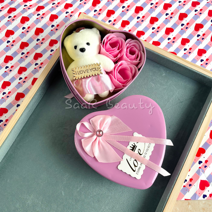 Heart-shaped Valentine’s Day gift box with a plush teddy bear, artificial roses, and an "I Love You" tag—perfect romantic gift for special occasions.