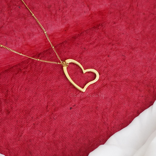 Gold open heart pendant necklace by SaaR Beauty, featuring a minimalist, anti-tarnish waterproof design in stainless steel for durability and elegance.