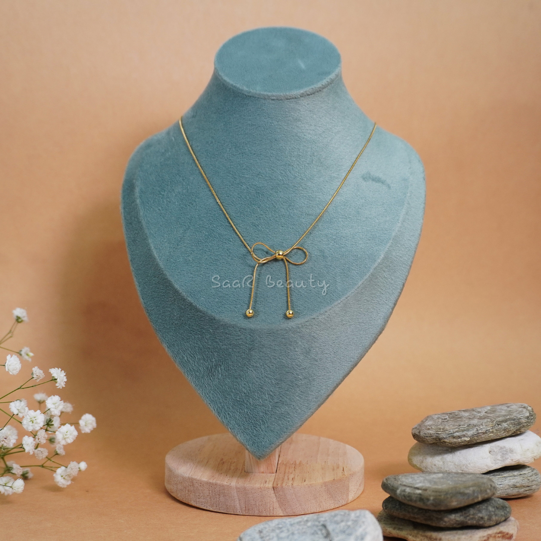 Graceful Bow Design Necklace – Cultural Charm in Gold by SaaR Beauty