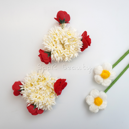 Add elegance to your hairstyle with the White Gajra Scrunchie with Red Roses. Perfect for weddings and festive occasions, this floral accessory blends jasmine and red roses for a striking traditional look.