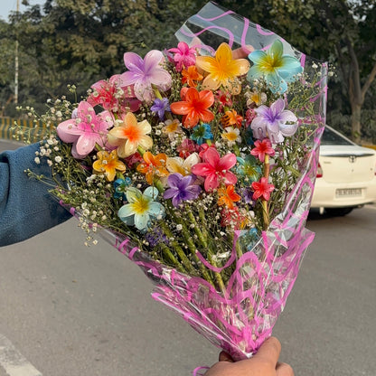 Upgrade your hair accessory collection with the Viral Flower Clutcher Bouquet. 21 colorful, durable flower-shaped clips for a chic touch to any look.