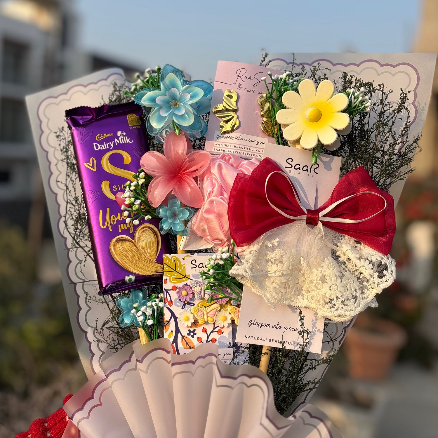 Saar Beauty Forever Bouquet Gift Hamper with Dairy Milk Love Chocolate, hair accessories and anti-tarnish earrings – perfect gift for women and girls